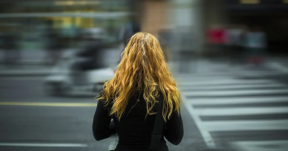 woman about to cross street