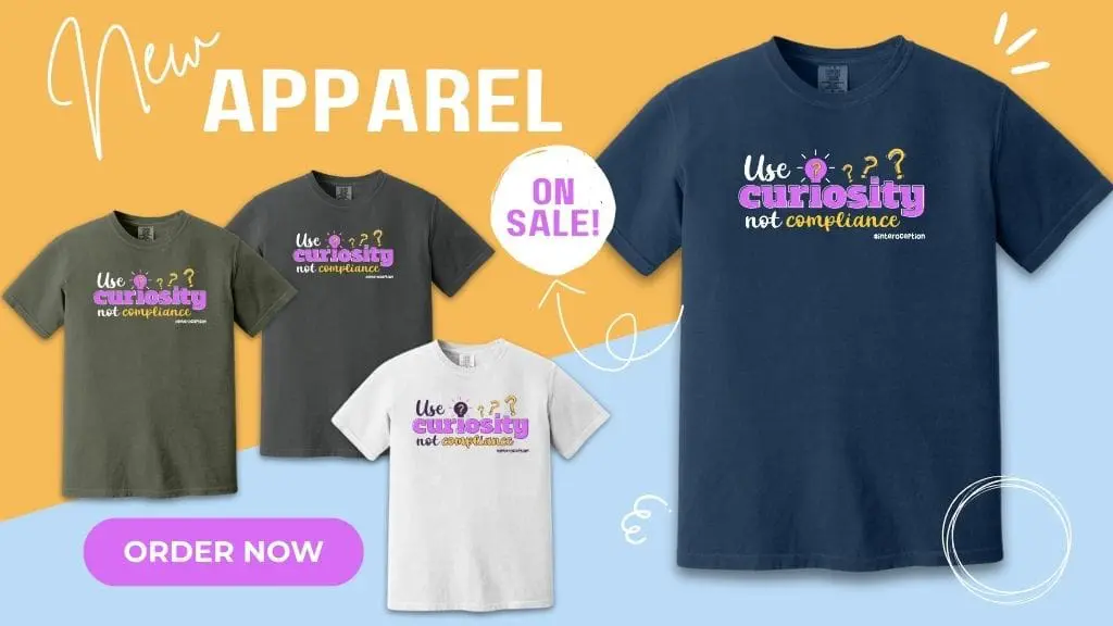 t-shirt carousel display navy blue, grey, positive message, curiousity, drawing sun graphic