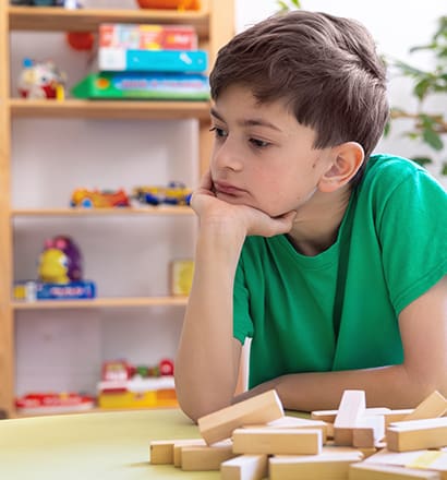 Child Showing Frustration During Learning Activity
